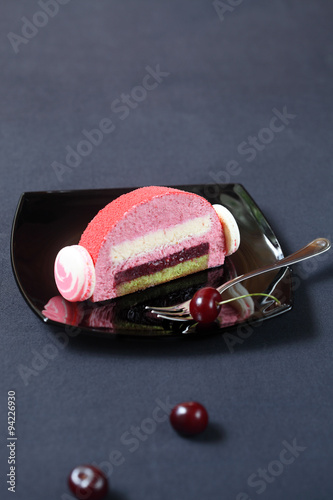 Piece of Cherry Lychee and Pistachio Yule Log Cake