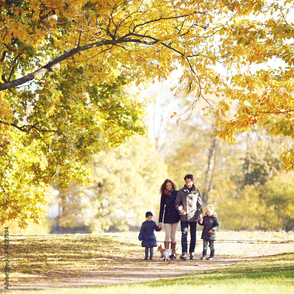 Family walking in autumn park Family walking in autumn park