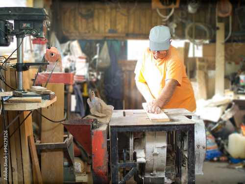 Carpenter in his workshop © romul014