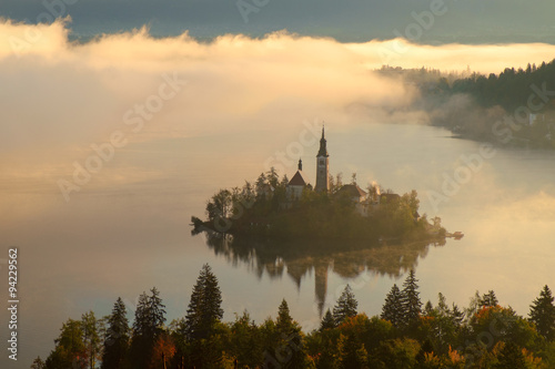 Misty sunrise on the lake Bled in autumn