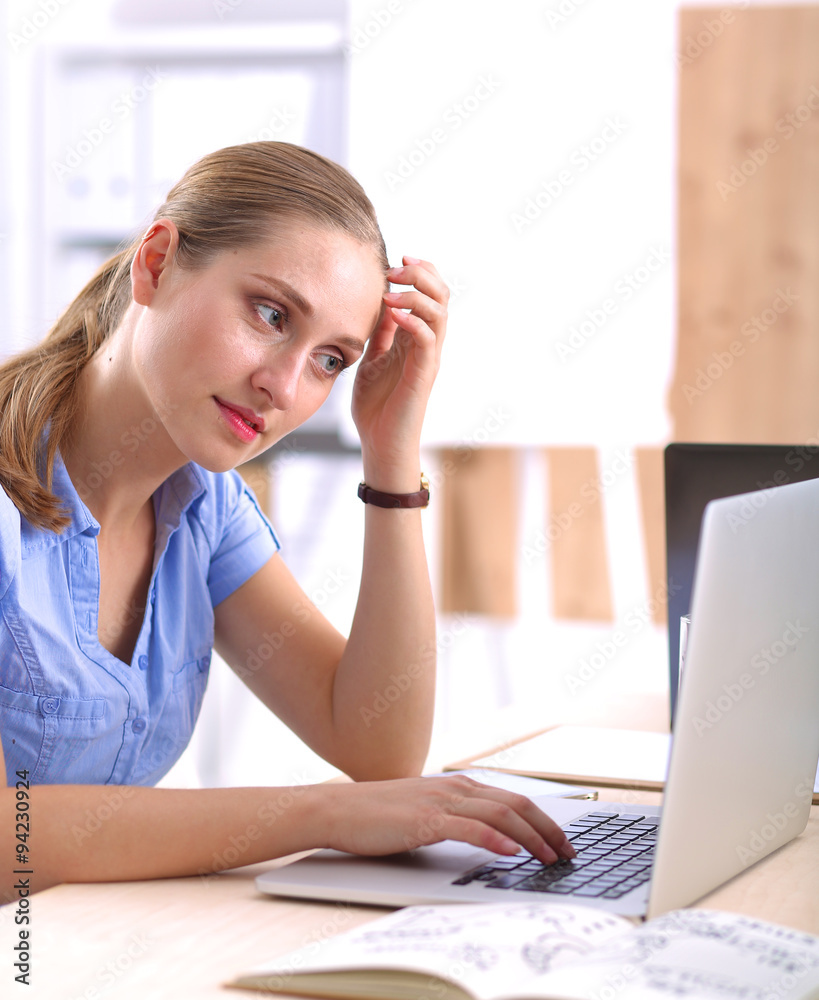 Modern beautiful business woman in the office Modern beautiful business woman in the office