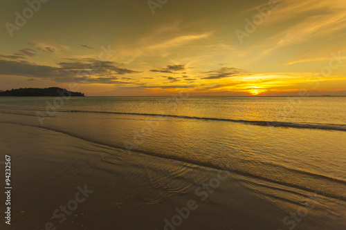 Sunset on the bay's beach © filipobr
