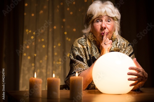 Canvas Print Telling fortune from magic ball