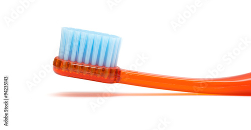 Red toothbrush isolated on a white background