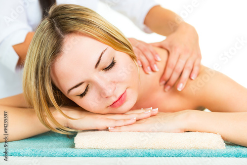 Beautiful young woman during the massage.