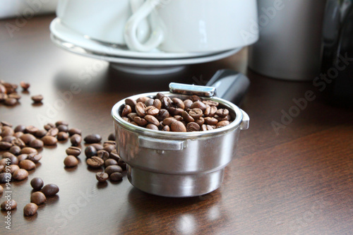 Coffee in a measured spoon.