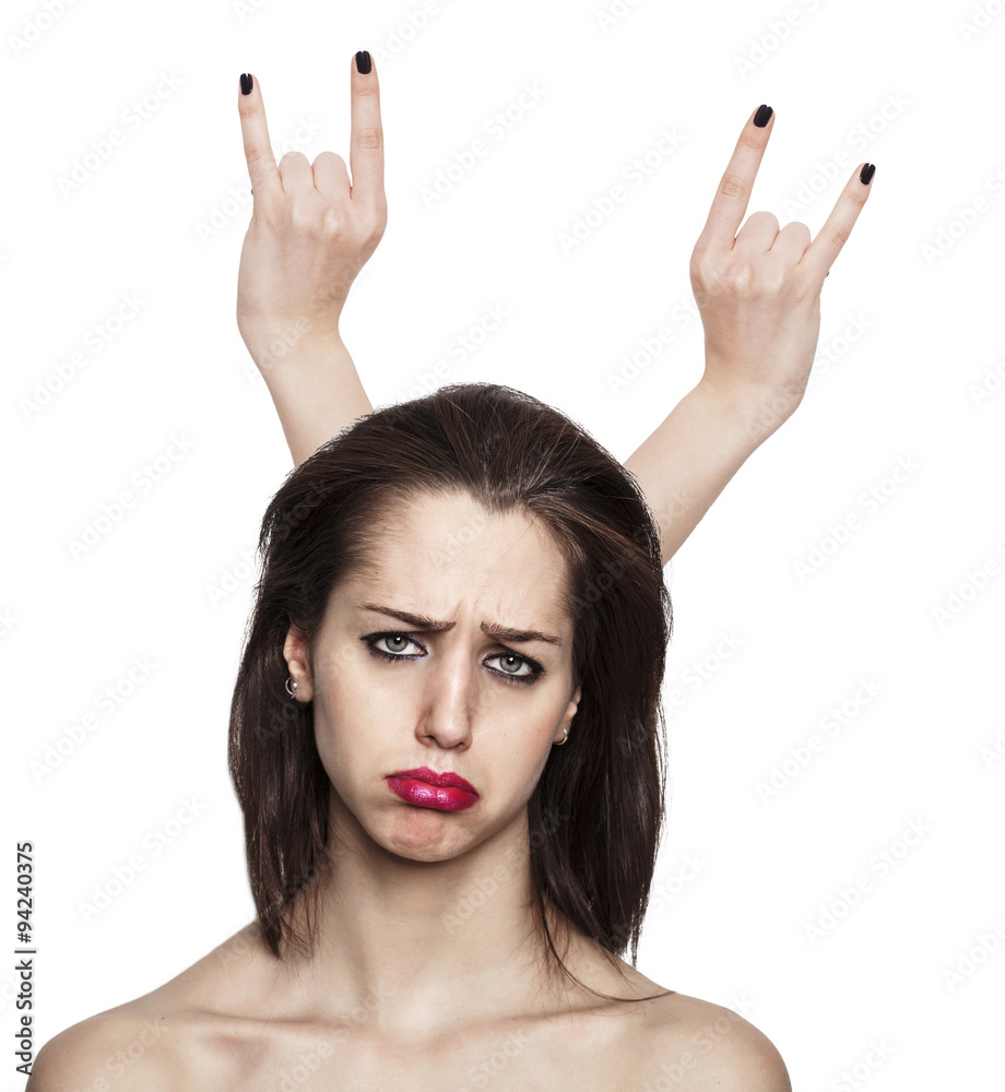 Sad girl portrait with hand horns