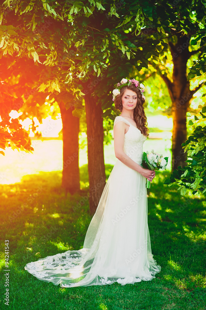 beautiful bride holding a wedding bouquet 