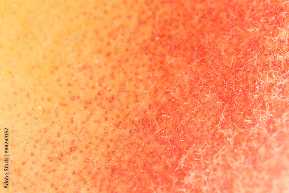 the skin of the peach as a background. close