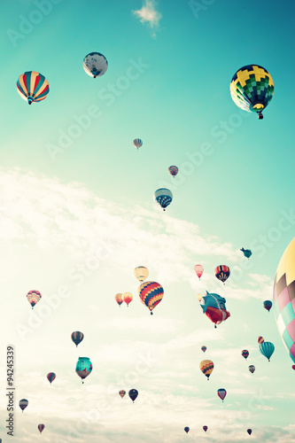 Vintage hot air balloons in flight