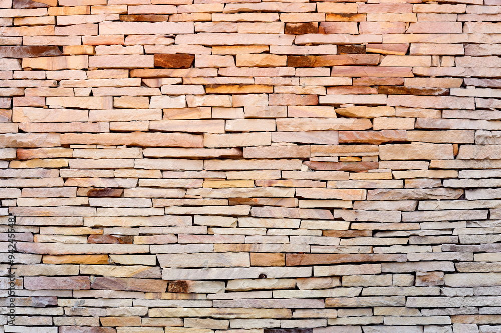 Fototapeta premium Pattern background color of crack real stone wall