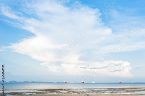 White cloud on blue sky and beach