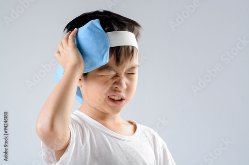 Boy headache and ice gel pack