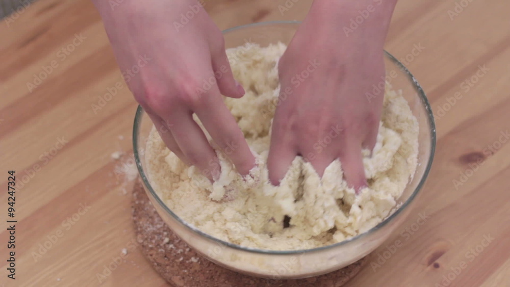 Woman hands knead dough Woman hands knead dough