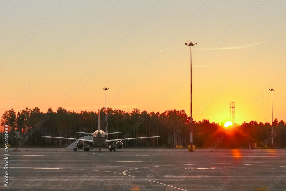 Airport and aircraft in sunset light