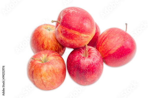 Pile of a red apples on a light background