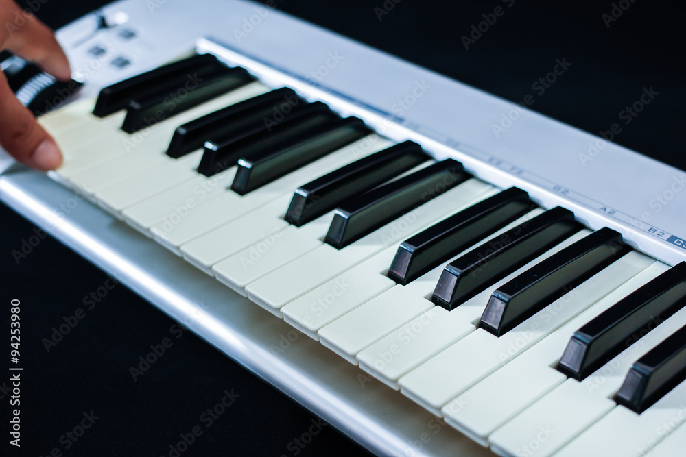 The midi keyboard controller on black background The midi keyboard controller on black background