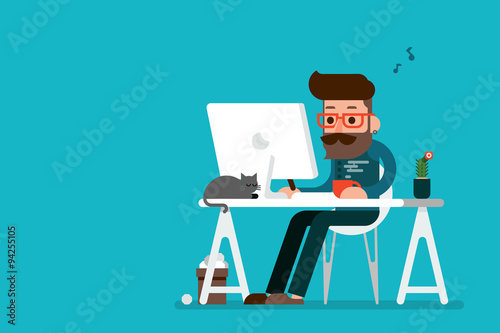 Happy man working on computer.