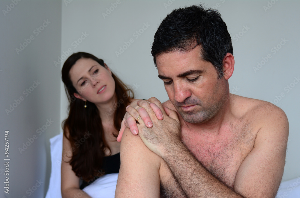 Fototapeta premium Upset couple having problems with sex