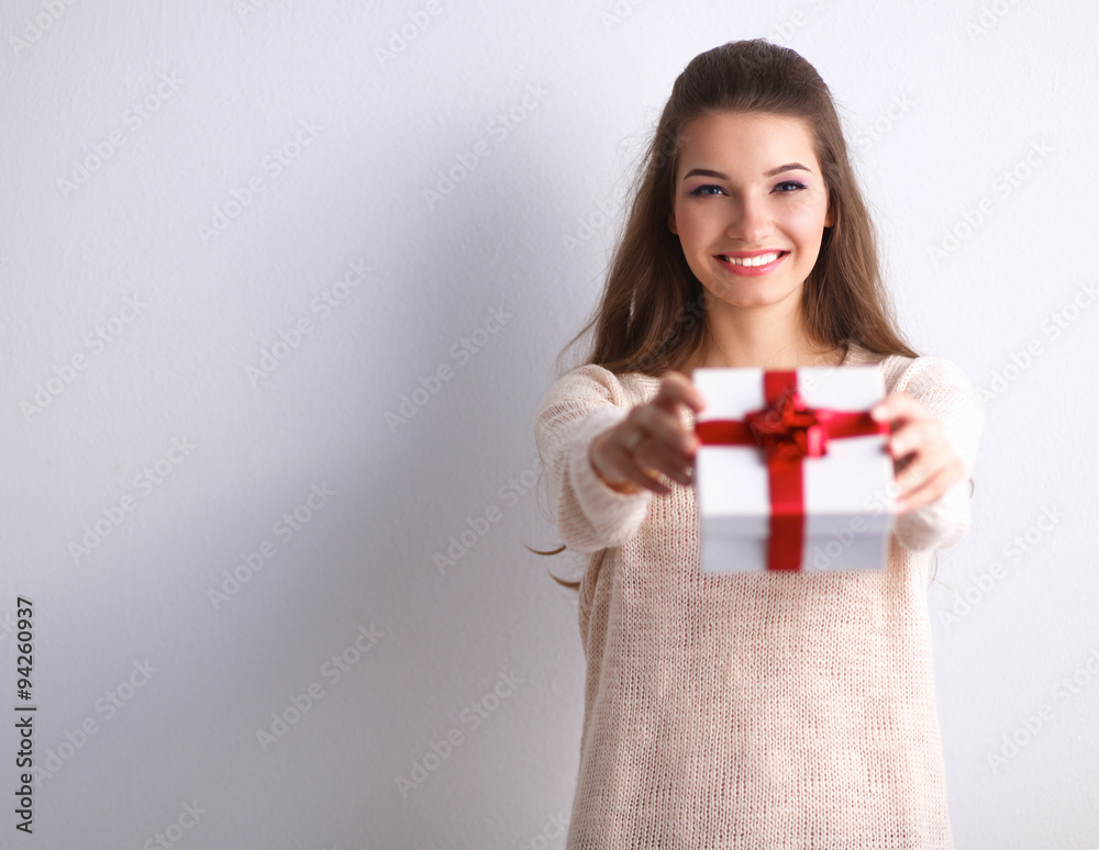 Young woman happy smile hold gift box in hands Young woman happy smile hold gift box in hands