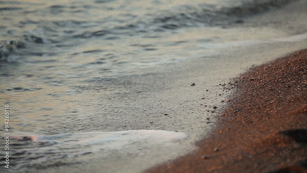 Fabulously shaped wave breaking on a beach at sunrise Fabulously shaped wave breaking on a beach at sunrise