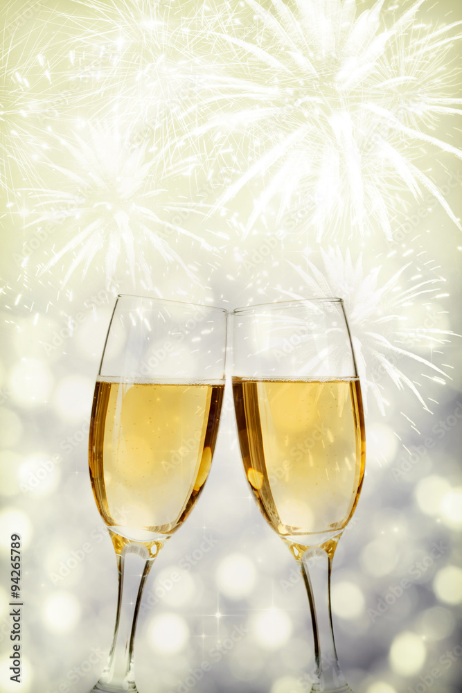 Celebrating New Year with champagne and fireworks Celebrating New Year with champagne and fireworks