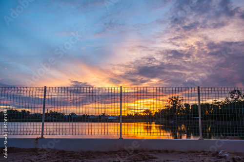Sunrise at the lakeside fence and eliminate freedom.