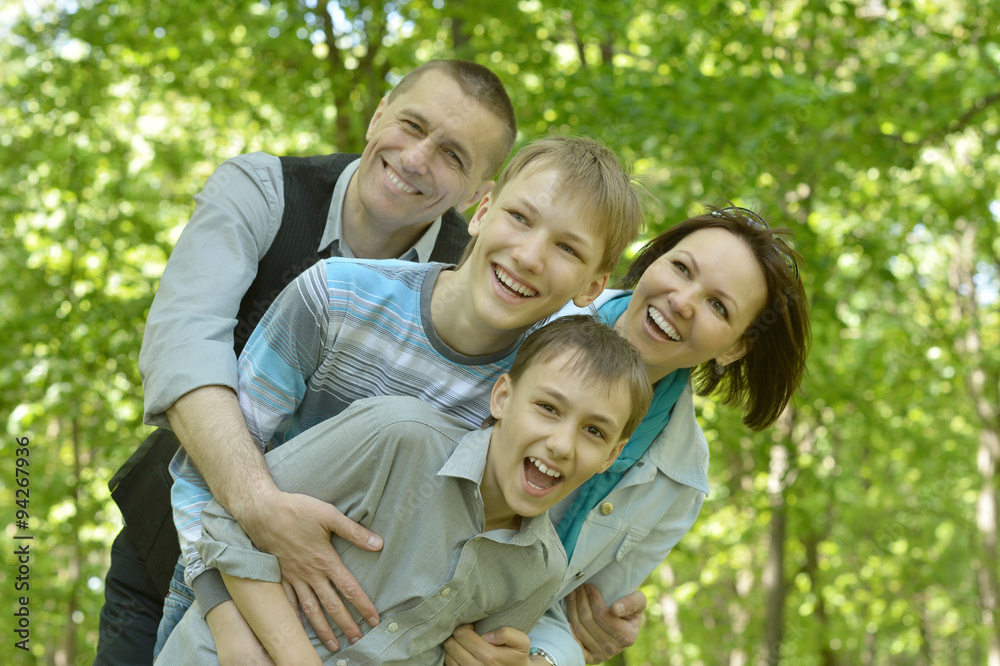 Happy family in autumn forest Happy family in autumn forest