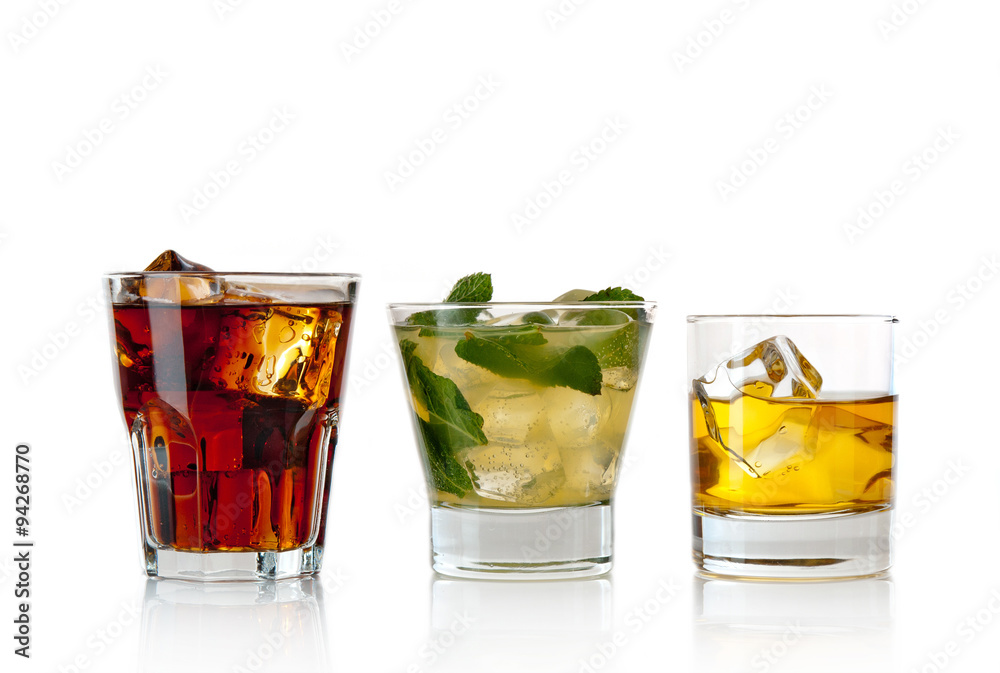 Various cocktails, drinks and shots over white background