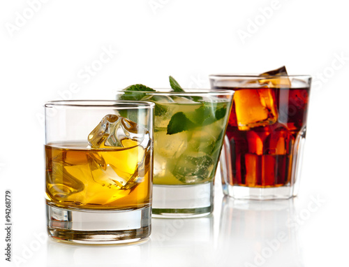 Various cocktails, drinks and shots over white background