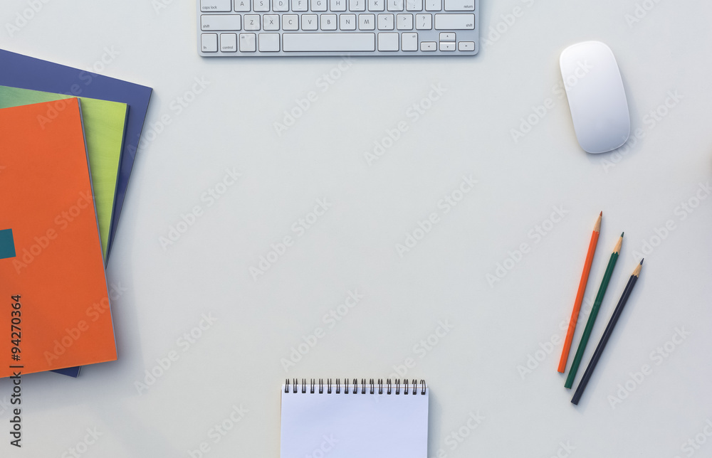 Office White Desk Top View with Business and Every Day Life Items and Electronics