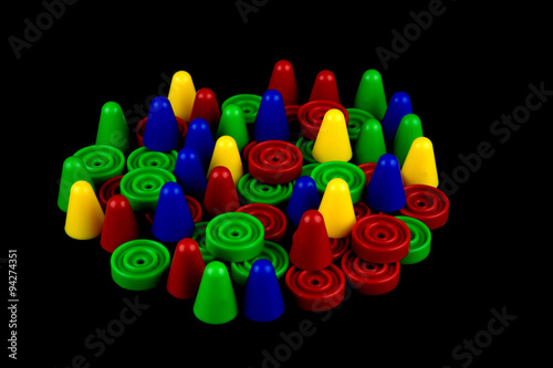 Board Game Pieces on Black Background