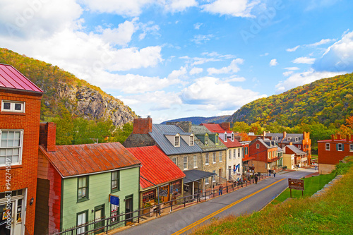 Harpers Ferry historic town in autumn and Blue Ridge Mountains. Houses on the street of historic town in Harpers Ferry National Historical Park, West Virginia, USA. photo