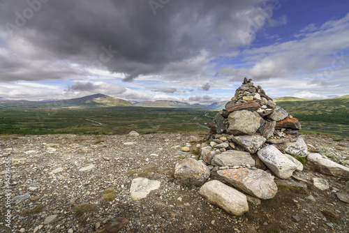 A cairn overlooking Dovrefjell National Park, Norway © Natureimmortal