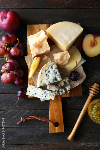 mix cheeses on rustic boards