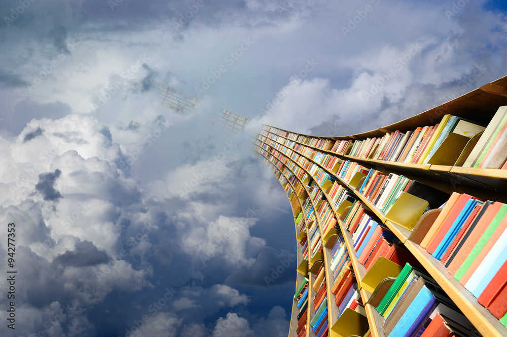 Obraz premium Round flying bookshelf against blue sky