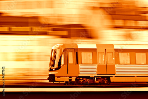 Panning blurred train on bridge