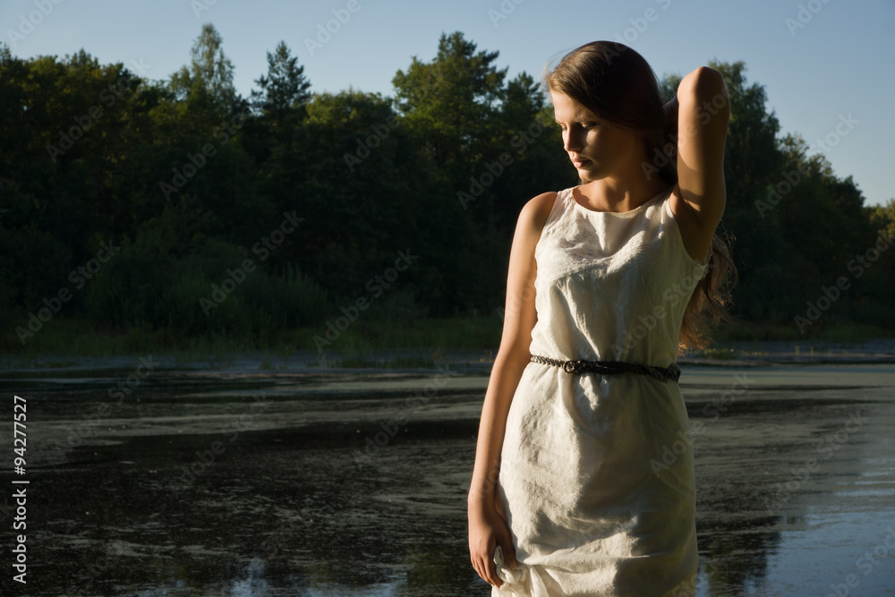 Pretty woman on the forest lake Pretty woman on the forest lake