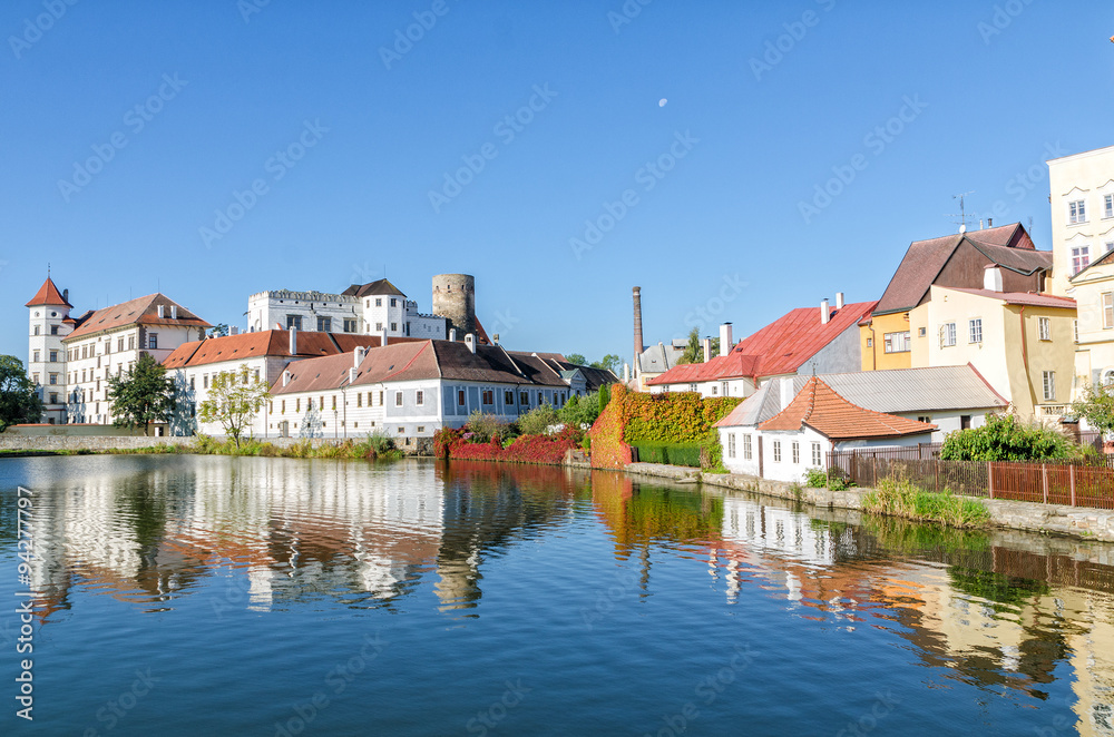 houses town and castle, reflecting in the lake