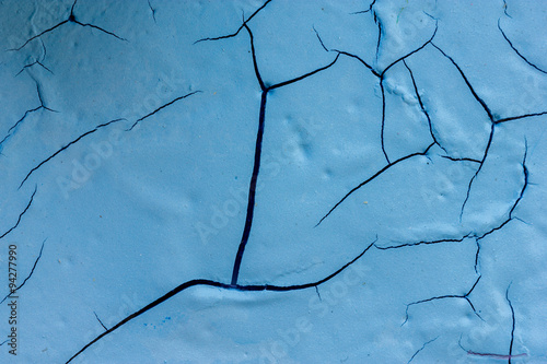 dry blue paint with crack 
