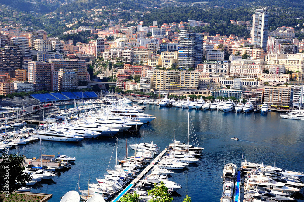 View to Monte Carlo bay with the row of yachts piers and hotels.  