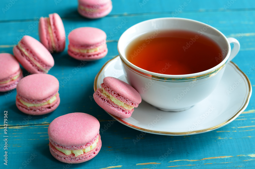 French Macarons with a cup tea French Macarons with a cup tea