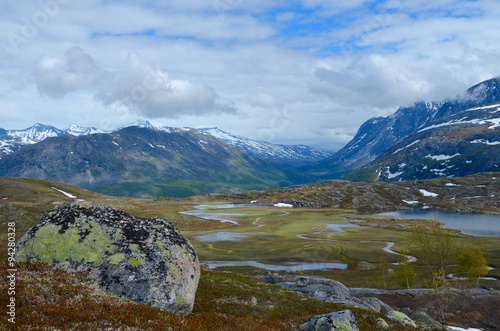 Marshland in valley in Norwegian subarctic mountains