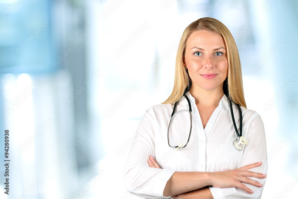 Image o fwoman doctor looking at camera Image o fwoman doctor looking at camera