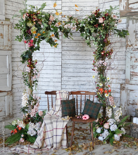 Vintage frame made from flowers, leaves with the grunge backgrou