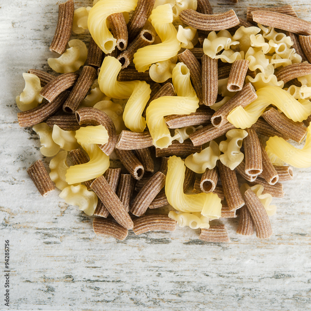 Raw pasta on table Raw pasta on table