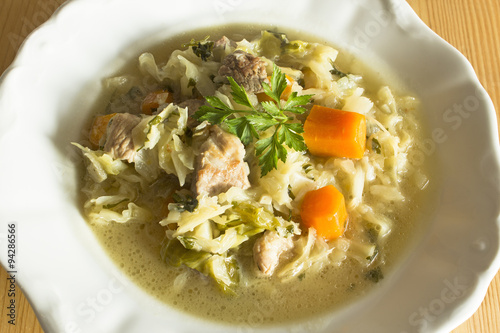 Boiled cabbage with pork and vegetables