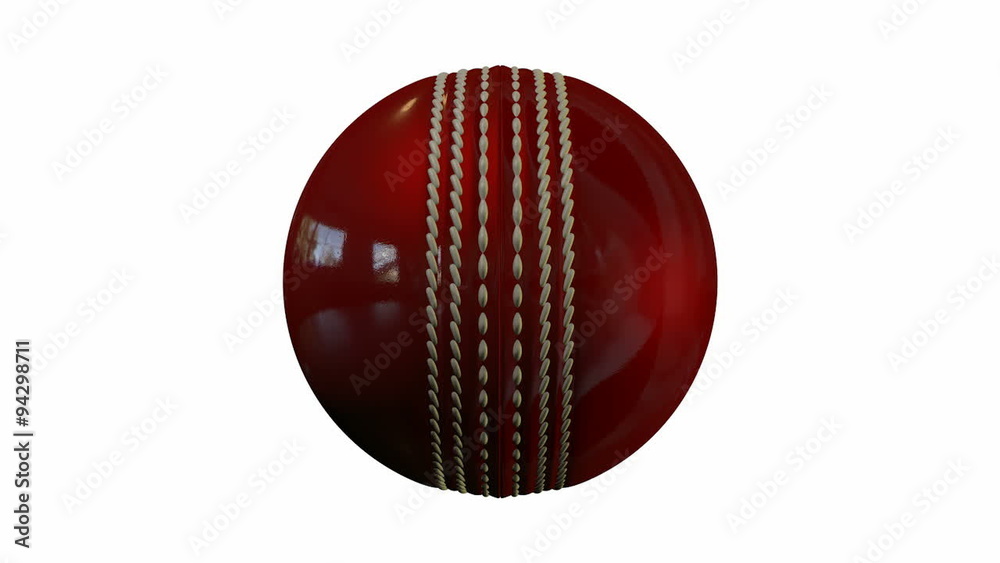 A shiny reflective red leather cricket ball spinning around on an isolated white background A shiny reflective red leather cricket ball spinning around on an isolated white background