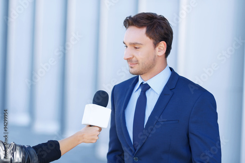 Cuadro en lienzo Young businessman is being interviewed.