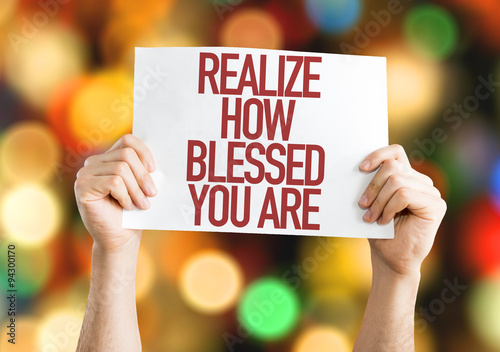 Realize How Blessed You Are placard with bokeh background